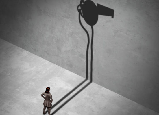 Woman confronting shadowy image of a large whistle, symbolizing whistleblowers